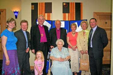 Pictured at the Church of Ireland General Synod in the City Hotel, Armagh on Thursday 11th May is L to R: Bronwen Dark, the Rev Nicholas Dark and 3 year-old daughter Claire, Archbishop John Neill, Archbishop Robin Eames, Sharon Cunningham, Joan Scott and Bobby Cunningham. (seated at front) Elizabeth Hill.