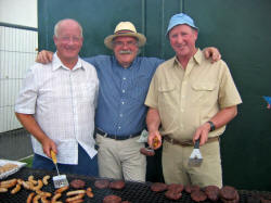 Derek Wilson, Norman McAlister and Phil Lewis were kept busy at the BBQ at Aghalee Parish Fair on Saturday 10th June.