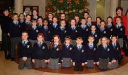 Nuala McGoran - conductor (left) and Maria Gough - Principal (right) pictured with St Joseph�s Primary School Choir at the 2006 Carols in the City Concert in the Lagan Valley Island on Wednesday 13th December. Missing from the photo is Nuala�s mother Monica McGoran who accompanied the choir on piano.
