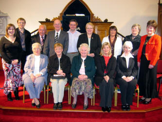 The choir from five Maze area churches that led the praise at the joint Palm Sunday evening service in Maze Presbyterian Church.  L to R: (seated) Ina Coffey, Joan Kirk, Muriel Adams - Organ, Kathryn Adams and Margaret Irwin.  (back row) Nicola Law - Piano, Harry McKendry, William McGeown, Richard Leathem, Robert Watson, Margaret Tolerton, Jennifer Kennedy, Maureen Hamill and Florence Leathem.