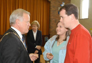 The Mayor - Councillor Trevor Lunn chats with Rachel Montgomery and Michael Thompson during refreshments following morning worship in Legacurry Presbyterian Church on Sunday 20th May. (Photo by Aaron McCracken).