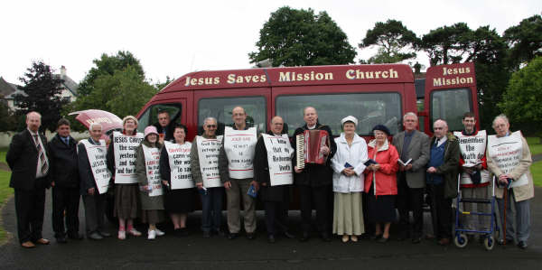 Members of Dunmurry Free Presbyterian Church and Jesus Saves Mission Church, Belfast pictured at an Open Air Gospel Meeting in Dunmurry last Saturday afternoon (30th June). 