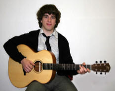 Nathan Jess pictured with his 'Gold Series' Avalon acoustic guitar, which he won at the Avalon competition held at Summer Madness.