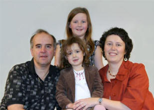 Karen Blythe pictured at Railway Street Presbyterian Church last Sunday morning with her husband Brian and their daughters Sophie and Kate-Lynn. 