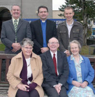 The Rev John Brackenridge pictured at the PWA service with Clonard Unity Pilgrims Harry Maguire (left) and Ed Peterson (right) and L or R: (seated) Geraldine Connolly, Patrick Connolly and Maura Maguire.