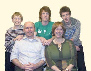 Thomas McConaghie (centre at back) pictured with his parents Euan and Julie and brothers Robbie (left) and Sam (right).
