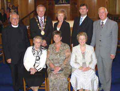L to R: Mrs Elsie Thompson - Principal (1956 - 1972), Mrs Angela Moore - Principal (1992 - present) and Mrs Mary McKeag - Principal (1972 - 1992). (back row) The Rev Dr Jack Richardson - Minister Emeritus (Chairman of the Board of Governors), Councillor Trevor Lunn MLA - Mayor, Mrs Laureen Lunn - Mayoress, Jeffrey Donaldson MP MLA - Lagan Valley MP and John Connor - Clerk of Session.