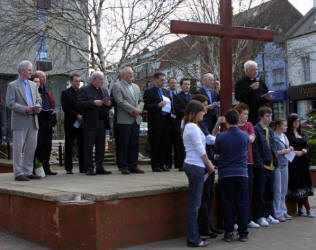 Lisburn Parish Priest - Fr Dermot McCaughan welcomes the large crowd who attended the short act of worship in Market Square following the annual Good Friday 'Carrying of the Cross' march of witness. 
