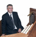 Organist Ross Morrow pictured at recently installed digital organ in Drumbeg Parish Church.