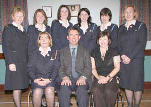 Chairman and Officers L to R: (seated) Latifa McCullagh (Captain), the Rev Angus McCullough (Chairman) and Joanne Moore (Guest of Honour). (back row) Officers - Evette Boyes, Alison Close, Elaine Henning, Karen McCoy, Madeline McCoy and Dorothy McCullough.