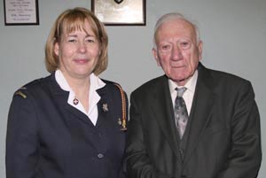 Latifa McCullagh (Captain) pictured with Senior Minister, the Rev Robert Larmour.