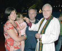 The Right Rev Harold Miller (Bishop of Down & Dromore) pictured with Des and Judith Cairns and their daughter Beth who are members of Lisburn Cathedral.