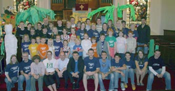 The Rev John Brackenridge and Matt Craig (centre at front) pictured with some of the 200 young people who enjoyed last year�s Holiday Bible Club at First Lisburn Presbyterian Church.