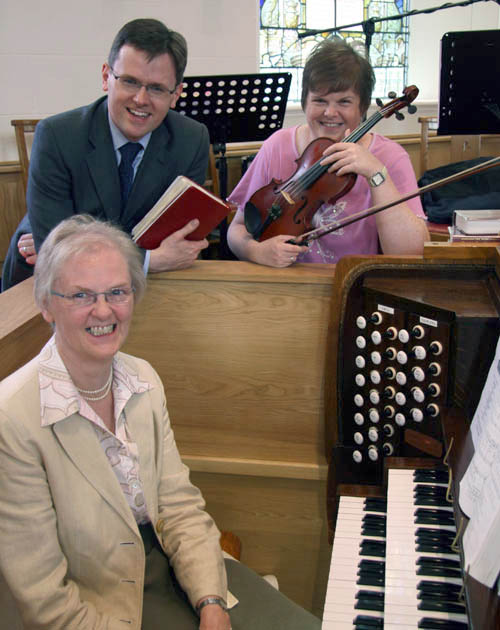 Bertha Cowan pictured with her son Martyn and daughter Rosie at morning worship in Railway Street Presbyterian Church last Sunday morning.