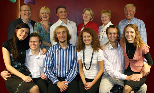 At Lisburn's Polish Mission Church's, second birthday party in the Kingdom Life City Church recently are L to R. (seated) Monika and Przemyslaw Feliga, Szczepan and Kamila Cackowscy and Lukasz and Kamila Nowicki. (back row) Brian and Mary Agnew (Kingdom Life), Slawomir and Katarzyna Cichy and Elizabeth and Mervyn Gilpin (Founder members).