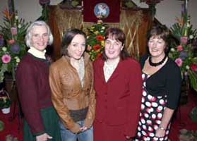 L to R: Mrs Valerie Gibson, Victoria Brown, the Rev Patsy Holdsworth and Mrs Vivienne McCullough. In the background can be seen the crisscross display of corn around the front of the pulpit, which has been the tradition at this church for over half a century.