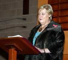 Norma Bell MBE, Chairperson of the Lisburn Action Cancer Group welcomes the large congregation. 