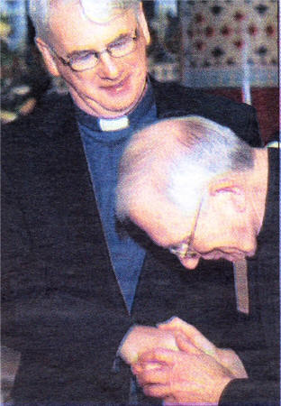 Monsignor Noel Treanor pictured at St Peter's in West Belfast with Bishop Patrick Walsh out going Bishop of Down and Connor. US0908-800SP