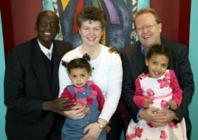 Pastor Brian Agnew pictured with missionary guests Nathan and Annmarie Asiimwe and their children Grace and Joy.