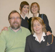 Latifa McCullagh (Captain) pictured with husband Alec and their daughters Tinies leaders Louise and Natalie.