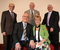 Pastor Clifford Morrison and his wife Margaret with elders L to R: Mr Robin McCluskey, Victor Scott and Robert Graham.