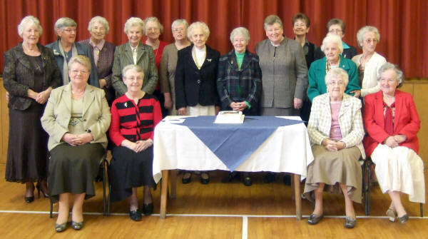 Elizabeth Walker, Acting Leader (left in back row) and Maje Sinclair (centre) pictured at Ballycairn Presbyterian Church PWA and PW Centenary on Sunday 5th April 2009