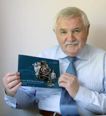 John Kelly shows the front cover of his new book entitled ‘Lisburn’s Rich Church Heritage’ 