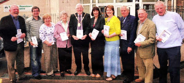 The Mayor Councillor Allan Ewart with Lisburn Downtown Centre Committee at the opening of the 'Charity Auction'. L to R: Colin McKay (Chairman), Sandy Fitzpatrick (Treasurer), Janet Moffett, Anabelle Poots MBE, Councillor Allan Ewart (Mayor), Sharon Bentham (Downtown Coordinator), Hilary Diamond (Secretary), Norman Mawhinney (Auctioneer), Stanley Allen and Ted Parkes.