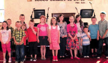 Children from Maghaberry Elim's Sunday School sing choruses at their annual concert and prize-giving service in the church