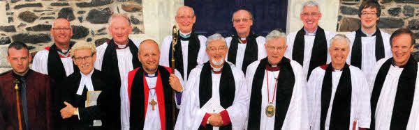 At the installation Service in Lisburn Cathedral, on Monday 2nd June are L to R: (front row) Darren Miller (Dean's Verger); His Honour Judge Rodgers (Chancellor of the Diocese); The Rt. Rev Alan Abernethy (Bishop of Connor); Rector of Derriaghy, the Rev Canon John Budd (Prebendary of Rasharkin); The Very Rev John Bond (Dean of Connor); Rector of St Patrick's, Ballymena, the Rev Canon Stuart Lloyd (Chancellor) and Rector of Dunluce, the Rev Canon George Graham (Prebendary of Connor)- (back row) Vicar of Antrim, Venerable Dr. Stephen McBride (Archdeacon of Connor); Rector of St Mary's, Belfast, the Rev Canon Percival Walker (Precentor); Rector of Ballinderry, the Rev Canon Ernest Harris (Prebendary of Cairncastle); Rector of Ballymacash, the Rev Canon George Irwin (Prebendary of Kilroot); Rector of Lisburn Cathedral, the Rev Canon Sam Wright (Treasurer); and Rev Simon Genoe (Lisburn Cathedral Curate).