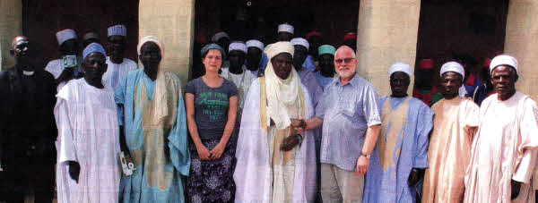 David Savage with Lucie Stanley from Wales meet HRH Ufuwai Bonet, the Mataba 
	or `the Untouchable,' the Chief of Kagoro and his council