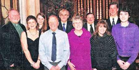 Some of the people who organised and took part in `Songs of Praise' at Hillsborough Parish Church. L to R: Nicola Prentice (nee Houston) and Norman, Mandy, Jayne and Jonathan Houston. Back row - Rev Mike Dornan (Curate), Jessica Hutchinson, Bill Clements (Castlewellan Accordion Band), Tom Whyte (Garvey Silver Band) and William Wallace (Waringsford Piper).