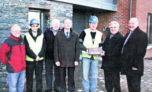 There to mark the formal handover of the new rectory were (l to r): Noel Martin (Property Committee representative); John Gray (Quantity Surveyor, M.E.Crowe Ltd); John Cochrane (Property Committee representative and member of the Select Vestry); solicitor Chris Mitchell of Thompson Mitchell (member of the Select Vestry); Robert McVeigh (Site Manager, M. E. Crowe Ltd); Chris Stevenson (Tate Stevenson, architects) and Dermot McCurdy (Property Committee representative).
