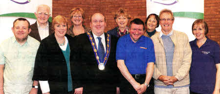 The Deputy Mayor and Mayoress with members of Prospects Regional Development Team at the Gospel Praise Night in Mount Zion Community Church. L to R: (front row) Stephen Gibson, Kathleen Leathern (Deputy Mayoress), Alderman William Leathem (Deputy Mayor), lrvine McCabe, Derek Polley (Chairman) and Fiona Murphy. (back row) Ronnie Hamilton, Tanya Polley, Anne Bodies and Jackie O'Neill.