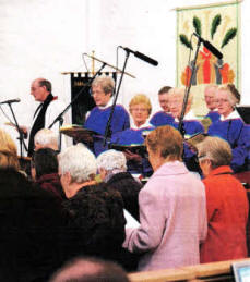 The church choir leading the thanksgiving praise at the service.