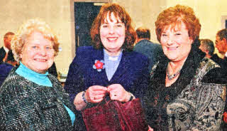 Sandra and Chloe Johnston (left) and Lorna and Courtney Conroy (right) present a gift to the Rev Patsy Holdsworth on behalf of Ballinderry Moravian Church Sunday School.