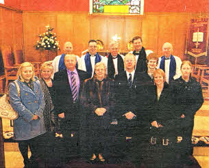 Members of the Cochrane family and clergy at the Service of Dedication in St Paul's, Lisburn.