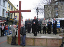 The Very Rev. Sean Rogan - St Patrickï¿½s Roman Catholic Church, is pictured leading the Easter praise during a short act of Worship in Market Square on Good Friday 25th March 2005.