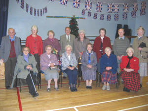 Pictured at the Senior Members Christmas Tea in Railway Street Presbyterian Church on Saturday 3rd December are L to R: (front row) Alice Shaw, Iris McKibbin, Sadie Magee, May French, Jean Patterson and Martha Thomson.  (back row) Alec Hanna, Kathleen Cromie, Betty Bowman, Very Rev. Dr. Howard Cromie, May Griffin, Margaret Mulholland, Eric Scott and Edna Hadden.