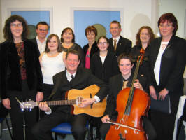St. Patrickï¿½s Folk Group pictured during final rehearsals before taking to the stage at the Carols in the City concert in Lagan Valley Island on Wednesday 14th December 2005. Pictured L to R : (seated) Neal Clenaghan - Guitar and Dermot Clenaghan - Cello. (back row) Geraldine Clenaghan - Leader, Andrew Magee - Keyboards and flute, Laura Waterworth, Deirdre Waterworth, Una Tracey, Dymphna Clenaghan, Patrick Hughes, Monica McCard and Marion Green.