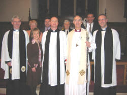 Pictured at the Institution Service in Lisburn Cathedral on Sunday 29th January 2006 is L to R: (front) Rev. Canon Sam Wright, Annette McGrath, Rev. Kenneth McGrath, the Bishop of Connor, the Rt. Rev. Alan Harper and the Rt. Rev. Dr. Maurice Elliott.  (back row) Martie Kennedy - Peoples Warden, Keith Neill - Youth and Outreach Worker, Canon Edgar Turner - Registrar and Paul Dougan - Rector�s Warden.