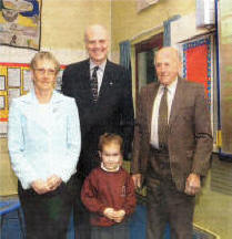 The launch of Anahilt Primary School's new Web Site. Pictured are Carol Shields, Derek Capper, Principal, Cherith Moffitt, youngest pupil and Wallace Beatty, one of the oldest ex-pupils. US02-530JC 