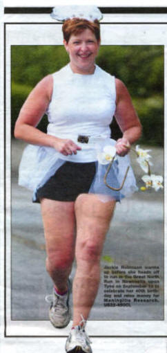 Jackie Robinson warms up before she heads off to run in the Great North Run in Newcastle upon Tyne on September 18 to celebrate her 40th birth-day and raise money for Meningitis Research. US32-450CL 