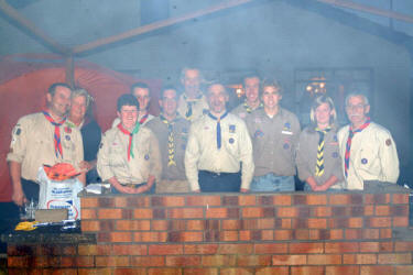 Scout leaders barely visible through the smoke at the BBQ, which was held after the Lisburn and District Scouts AGM on Wednesday 23rd August at Lisburn Rugby Club.