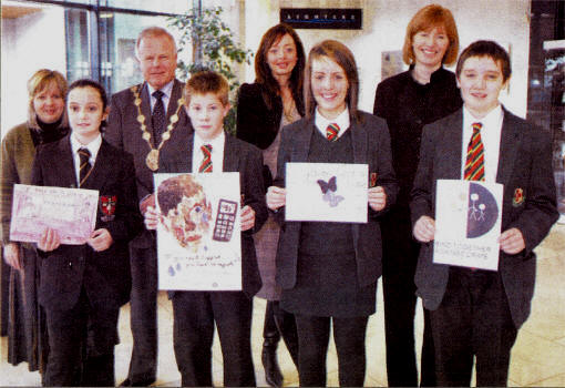 Competition winners Chloe Gorman, Reuben Steenson, Sarah Guinn and Adam Boucher at the award ceremony for the You can Change your World Competition with Caroline Johnson from Lisnagarvey High School, Lisburn Mayor Councillor Trevor Lunn, Paula Smith from Friends' School and Mrs Elizabeth Dickson, Principal of Friends'.