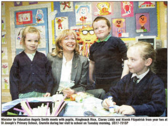Minister for Education Angela Smith meets with pupils, Rioghnach Rice, Ciaran Liddy and Niamh Fitzpatrick from year two at St Joseph's Primary School, Crumlin during her visit to school on Tuesday morning. US17-731SP