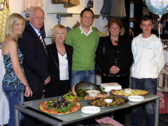 L to R: Lisa, John and Margaret McAteer, Chris Kelly, Blanche and Stuarty Irvine eye up the beautiful selection of sea food on offer to the many people who attended the opening night of �ICHI�, the great new fashion store in Lisburn last Thursday (19th April).