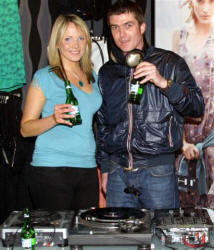 Local DJ Rick Rude and promotion girl - Laura McGuigan from Dillon Bass were in charge of musical entertainment and refreshments at the opening night of �ICHI�, the great new fashion store in Lisburn last Thursday (19th April).