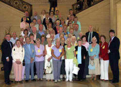 Elsie Vance and Basil McCrea MLA (right) with some of the group on the steps of the Great Hall.