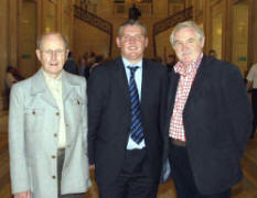 Eric Scott and John Kelly with John McCallister MLA in the Great Hall.